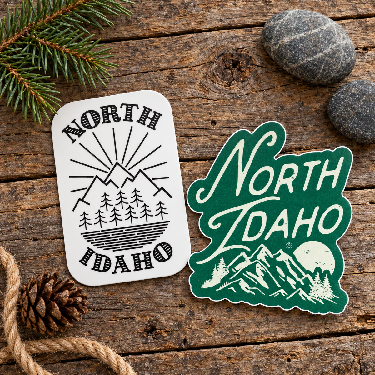 North Idaho stickers and gifts arranged on rustic wood
