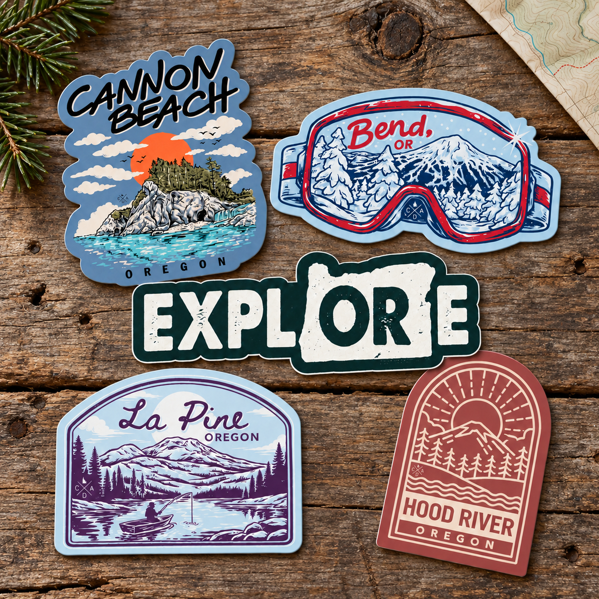 Oregon stickers arranged on rustic wood