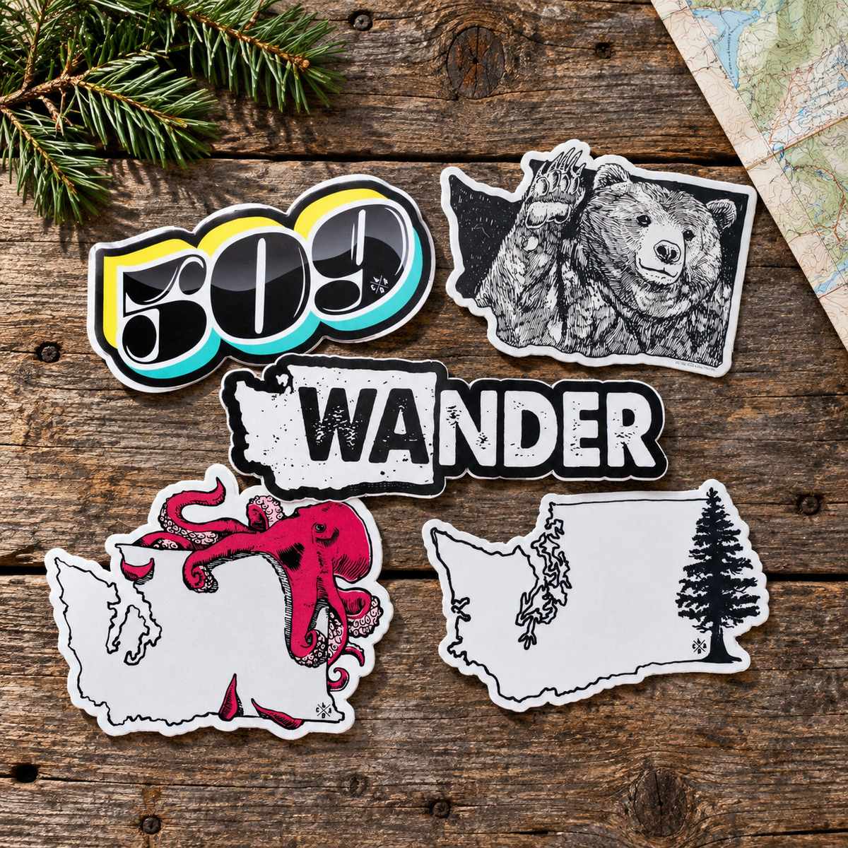 Washington stickers arranged on rustic wood