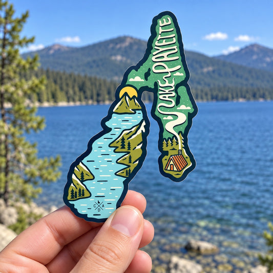Lake Payette Outline sticker held outdoors beside Payette Lake in Idaho